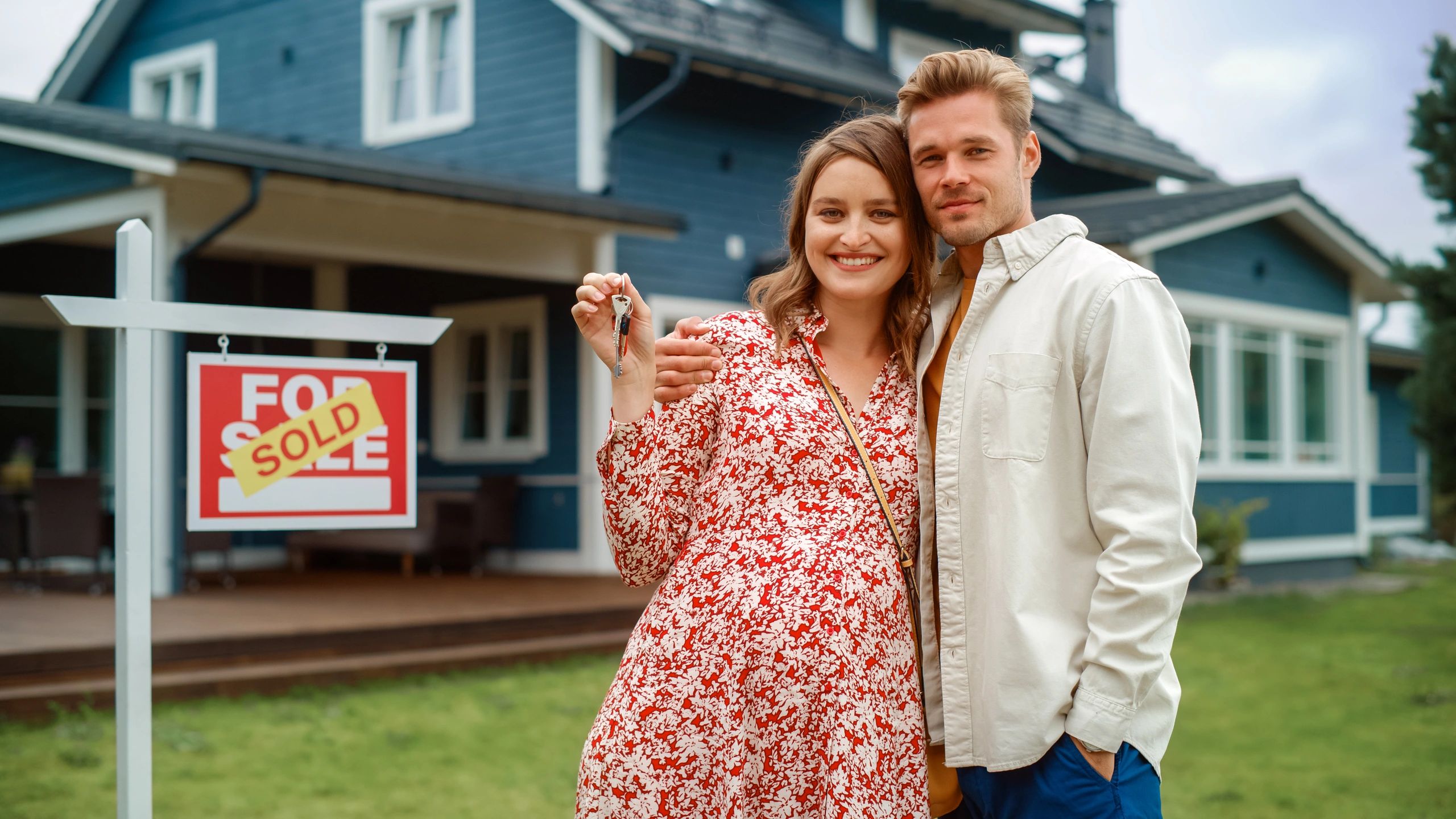 happy homeowners sold house
